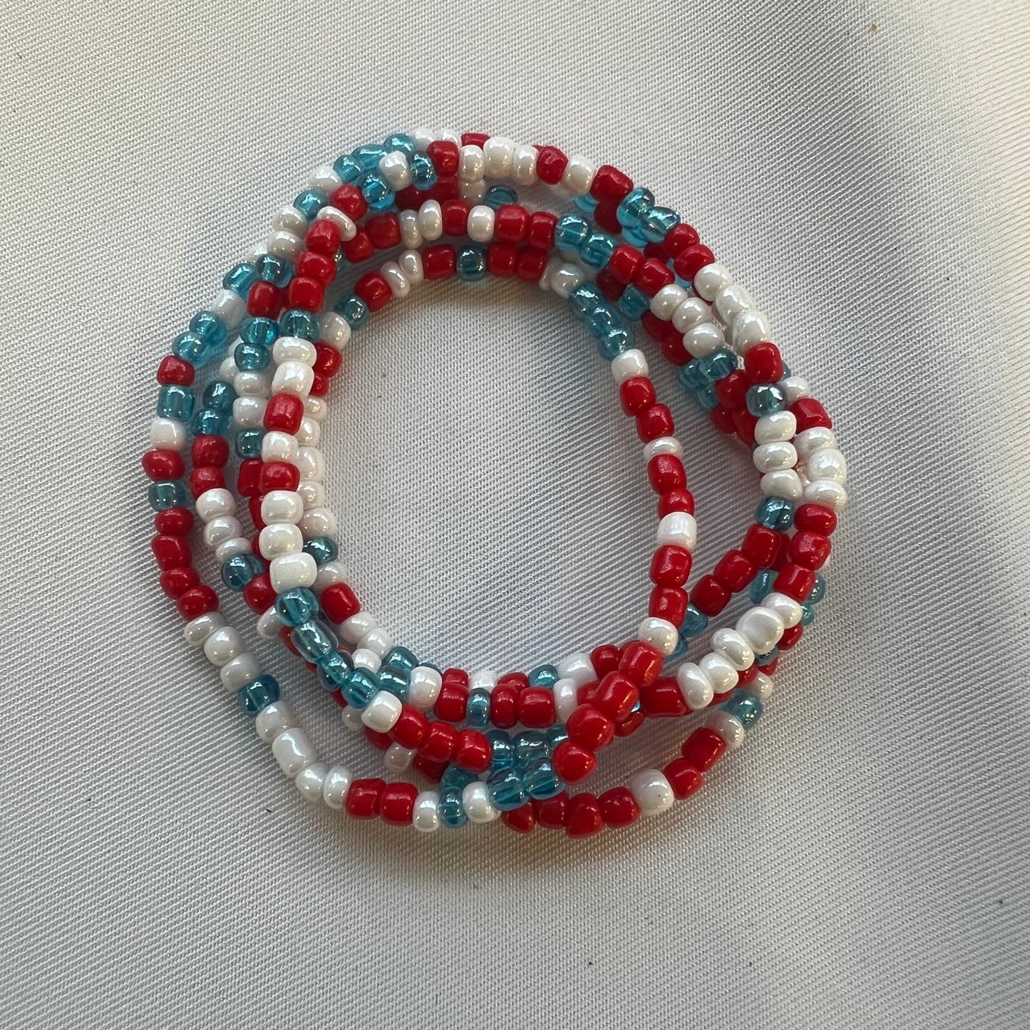 Bijou en perles multifonction rouge, blanc et bleu
